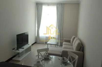 Living Room image for: Apartment - 1 Bedroom - 2 Bathrooms for rent in Durar 1 - Dubai Residence Complex - Dubai, Image 1