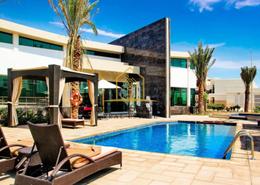 Pool image for: Apartment - 1 bedroom - 2 bathrooms for sale in Al Waha - Al Ghadeer - Abu Dhabi, Image 1