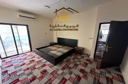 Room / Bedroom image for: Apartment - 2 Bedrooms - 2 Bathrooms for rent in Geepas Building 3 - Al Rashidiya 2 - Al Rashidiya - Ajman, Image 1