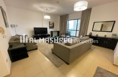 Living Room image for: Apartment - 3 Bedrooms - 4 Bathrooms for rent in Shams 1 - Shams - Jumeirah Beach Residence - Dubai, Image 1