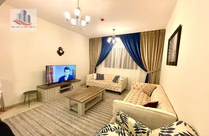 Living Room image for: Apartment - 1 Bedroom - 2 Bathrooms for rent in Bin Ham Towers - Al Taawun - Sharjah, Image 1