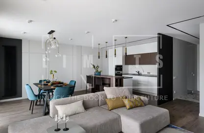 Living / Dining Room image for: Apartment - 1 Bedroom - 2 Bathrooms for sale in Vita Grande - Jumeirah Village Circle - Dubai, Image 1