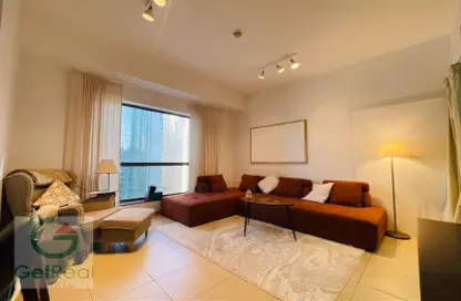 Living Room image for: Apartment - 1 Bedroom - 2 Bathrooms for rent in Bahar 6 - Bahar - Jumeirah Beach Residence - Dubai, Image 1