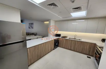 Kitchen image for: Apartment - 1 Bedroom - 2 Bathrooms for rent in Al Multaqa Avenue - Mirdif Hills - Mirdif - Dubai, Image 1