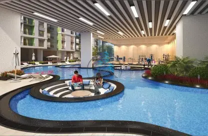 صورة لـ حوض سباحة شقة - غرفة نوم - 1 حمام للبيع في أوليفز ريزيدينس - المدينة الدولية - دبي ، صورة رقم 1