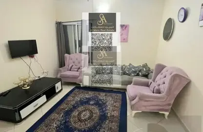 شقة - غرفة نوم - 2 حمامات للايجار في أورينت تاور 1 - أورينت تاور - البستان - عجمان