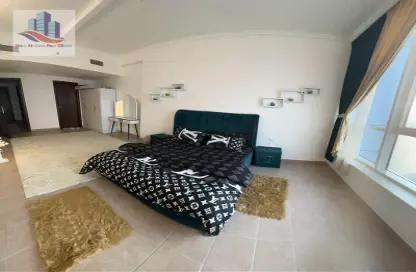 Room / Bedroom image for: Apartment - 1 Bedroom - 2 Bathrooms for rent in Al Mamzar - Sharjah - Sharjah, Image 1
