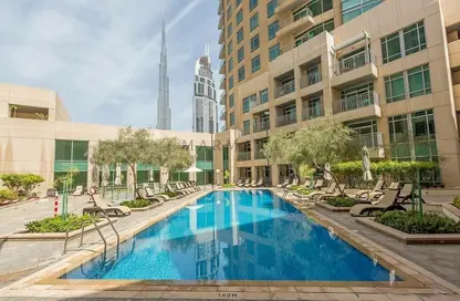 صورة لـ حوض سباحة شقة - 2 غرف نوم - 2 حمامات للبيع في A برج فيوز - برج فيوز - دبي وسط المدينة - دبي ، صورة رقم 1