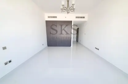 Empty Room image for: Apartment - 1 Bedroom - 2 Bathrooms for rent in Trio Building - Al Barsha 1 - Al Barsha - Dubai, Image 1