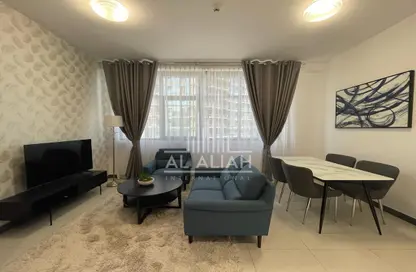 Living / Dining Room image for: Apartment - 1 Bedroom - 2 Bathrooms for rent in Capital Views - Capital Centre - Abu Dhabi, Image 1