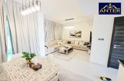 Living / Dining Room image for: Townhouse - 3 Bedrooms - 3 Bathrooms for rent in Albizia - Damac Hills 2 - Dubai, Image 1