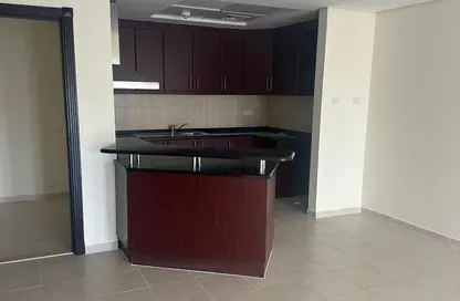Kitchen image for: Apartment - 1 Bedroom - 2 Bathrooms for rent in Building 38 to Building 107 - Mediterranean Cluster - Discovery Gardens - Dubai, Image 1