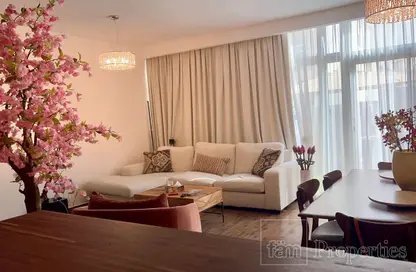 Living Room image for: Townhouse - 3 Bedrooms - 3 Bathrooms for sale in Albizia - Damac Hills 2 - Dubai, Image 1