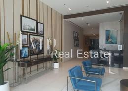 Living Room image for: Apartment - 2 bedrooms - 3 bathrooms for sale in Golf Panorama A - Golf Panorama - DAMAC Hills - Dubai, Image 1