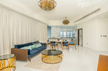 Living / Dining Room image for: Apartment - 2 Bedrooms - 2 Bathrooms for rent in Miraclz Tower by Danube - Arjan - Dubai, Image 1