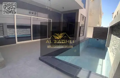 Villa - 5 Bedrooms - 7 Bathrooms for sale in Ajman Hills - Al Alia - Ajman