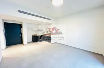 Living Room image for: Apartment - 1 Bedroom - 1 Bathroom for rent in The Link - East Village - Aljada - Sharjah, Image 1