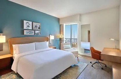 صورة لـ غرفة- غرفة النوم النزل و الشقق الفندقية - غرفة نوم - 2 حمامات للايجار في إليمنت لويستن - الجداف - دبي ، صورة رقم 1