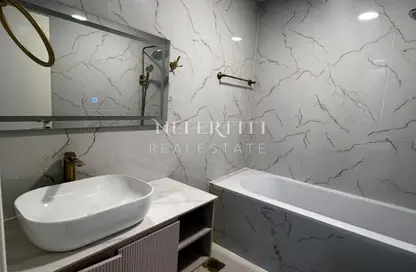 Apartment - 1 Bedroom - 2 Bathrooms for sale in Lilies Tower - Emirates City - Ajman Apartment - 1 Bedroom - 2 Bathrooms for sale in Lilies Tower - Emirates City - Ajman