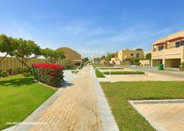 Garden image for: Townhouse - 3 bedrooms - 4 bathrooms for sale in Muzera Community - Al Raha Gardens - Abu Dhabi, Image 1