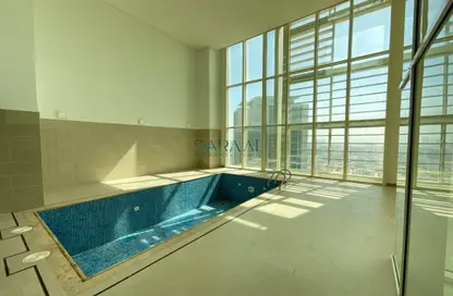 Pool image for: Penthouse - 5 Bedrooms - 7 Bathrooms for sale in Burooj Views - Marina Square - Al Reem Island - Abu Dhabi, Image 1