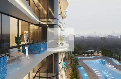 صورة لـ حوض سباحة شقة - غرفة نوم - 2 حمامات للبيع في براري فيوس - مجان - دبي ، صورة رقم 1