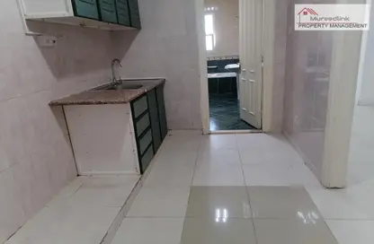 صورة لـ مطبخ شقة - 1 حمام للايجار في الزهراء - أبوظبي ، صورة رقم 1