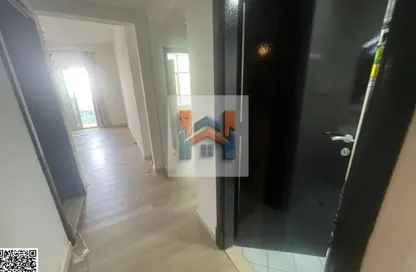 شقة - غرفة نوم - 2 حمامات للايجار في أورينت تاور 1 - أورينت تاور - البستان - عجمان