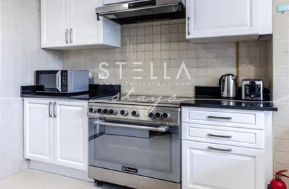 Kitchen image for: Apartment - 2 Bedrooms - 3 Bathrooms for rent in Stella - Barsha Heights (Tecom) - Dubai, Image 1