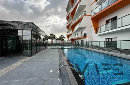 Pool image for: Apartment - 2 Bedrooms - 2 Bathrooms for sale in Binghatti Gate - Jumeirah Village Circle - Dubai, Image 1