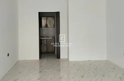 Shop - Studio - 1 Bathroom for rent in Al Shafar Park Tower - Al Karama - Dubai