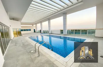 Pool image for: Apartment - 2 Bedrooms - 4 Bathrooms for rent in C2302 - Khalifa City A - Khalifa City - Abu Dhabi, Image 1