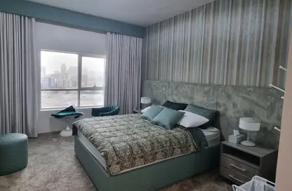 Apartment - 2 Bedrooms - 2 Bathrooms for sale in Orient Towers - Al Bustan - Ajman