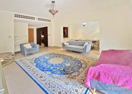 Living Room image for: Apartment - 2 bedrooms - 3 bathrooms for sale in Zanzebeel 4 - Zanzebeel - Old Town - Dubai, Image 1