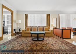 Living Room image for: Hotel and Hotel Apartment - 1 bedroom - 2 bathrooms for rent in Ritz Carlton - DIFC - Dubai, Image 1