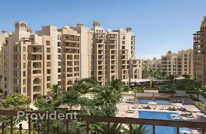 Outdoor Building image for: Apartment - 1 Bedroom - 1 Bathroom for sale in Al Jazi 2 - Madinat Jumeirah Living - Umm Suqeim - Dubai, Image 1