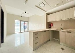 Kitchen image for: Apartment - 1 bedroom - 2 bathrooms for sale in MAG 550 - Mag 5 Boulevard - Dubai South (Dubai World Central) - Dubai, Image 1