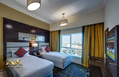 شقة - غرفة نوم - 2 حمامات للايجار في فندق غايا الكبير - مدينة دبي للإنتاج (اي ام بي زد) - دبي
