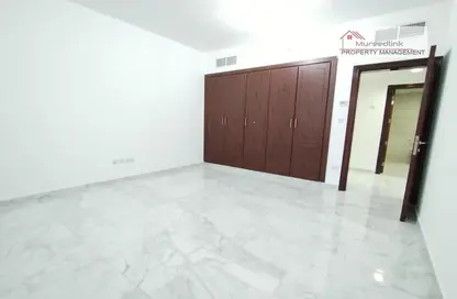 Room / Bedroom image for: Apartment - 2 Bedrooms - 2 Bathrooms for rent in Al Mamoura - Muroor Area - Abu Dhabi, Image 1
