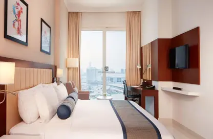 صورة لـ غرفة- غرفة النوم النزل و الشقق الفندقية - غرفة نوم - 1 حمام للايجار في تريبان للاجنحة الفندقية لفخر الدين - مدينة دبي الرياضية - دبي ، صورة رقم 1
