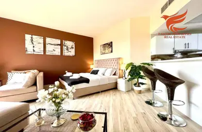 Living Room image for: Apartment - 1 Bathroom for rent in Kahraman - Bab Al Bahar - Al Marjan Island - Ras Al Khaimah, Image 1