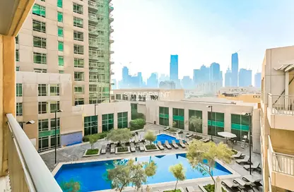 صورة لـ حوض سباحة شقة - 1 حمام للايجار في بوديوم برج فيوز - برج فيوز - دبي وسط المدينة - دبي ، صورة رقم 1