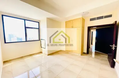 Empty Room image for: Apartment - 1 Bedroom - 2 Bathrooms for rent in Al Nada Tower - Al Nahda - Sharjah, Image 1