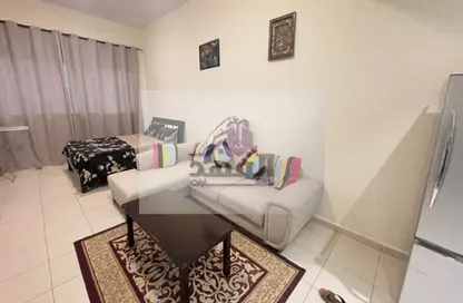 Living Room image for: Apartment - 1 Bathroom for rent in Ajman One Tower 1 - Ajman One - Ajman Downtown - Ajman, Image 1