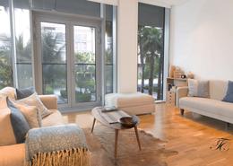 Living Room image for: Apartment - 1 bedroom - 2 bathrooms for sale in Apartment Building 5 - Bluewaters Residences - Bluewaters - Dubai, Image 1