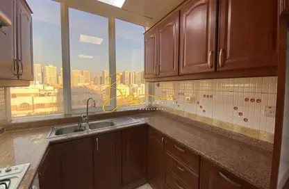 Kitchen image for: Apartment - 2 Bedrooms - 2 Bathrooms for rent in Muroor Area - Abu Dhabi, Image 1