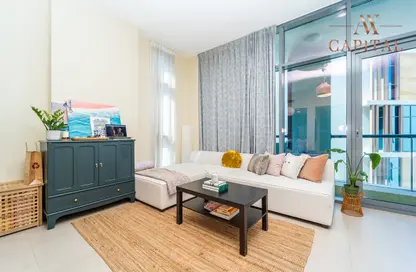 Living Room image for: Apartment - 1 Bathroom for sale in Dubai Wharf Tower 2 - Culture Village - Dubai, Image 1