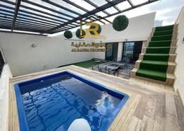Pool image for: Villa - 5 bedrooms - 7 bathrooms for sale in Al Zaheya Gardens - Al Zahya - Ajman, Image 1