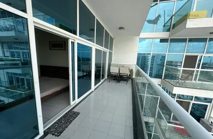 Balcony image for: Apartment - 3 Bedrooms - 3 Bathrooms for rent in Glitz 1 - Glitz - Dubai Studio City - Dubai, Image 1