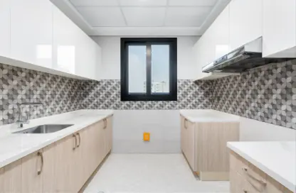 Kitchen image for: Apartment - 1 Bedroom - 2 Bathrooms for sale in Barari Hills Residence - Majan - Dubai, Image 1